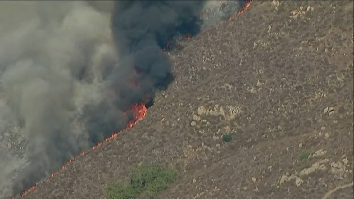 Evacuation orders issued after fire sparks in northeast San Diego ...