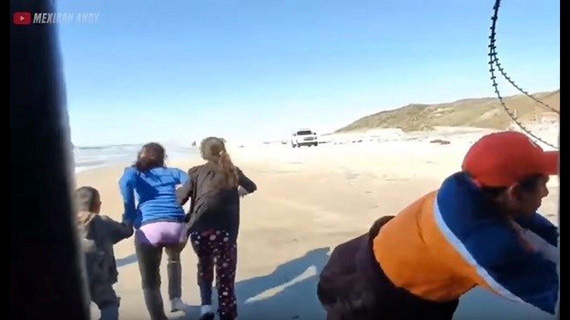 VIDEO Dozens of migrants breach border wall in San Diego, 50+ arrested