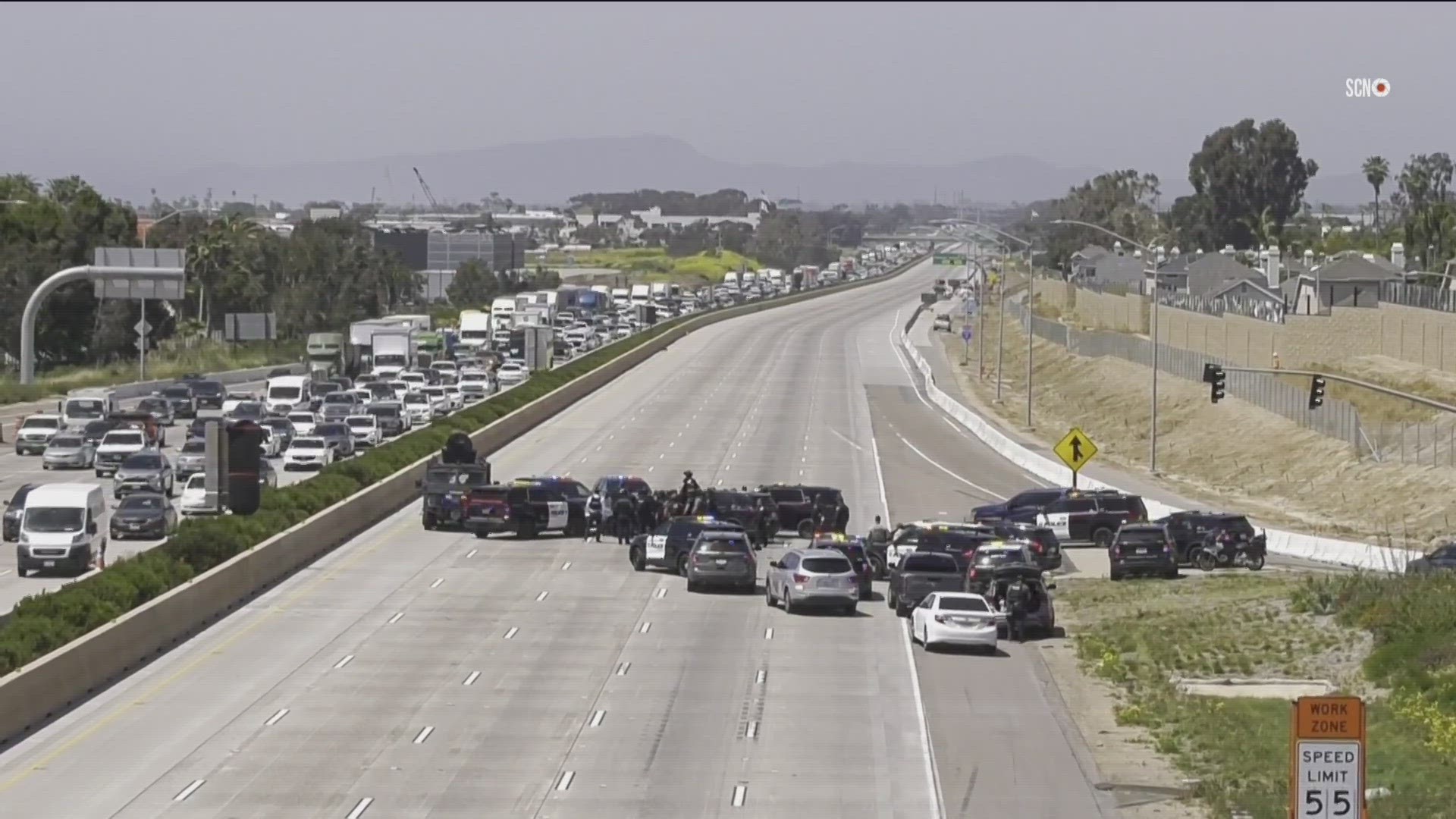Northbound Interstate 5 in Carlsbad was shut down while police negotiated a suspect who led authorities on a chase into custody.