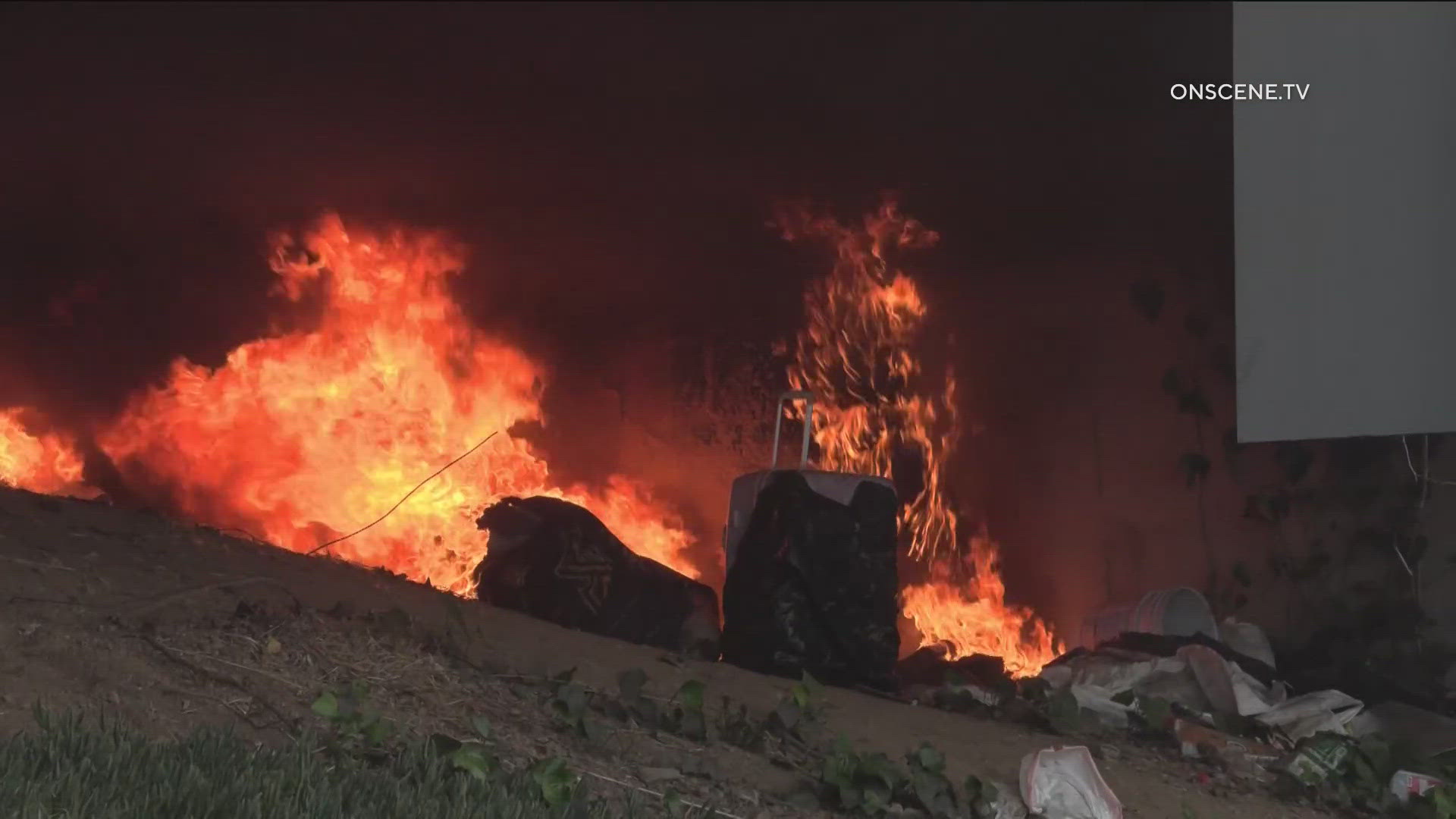Encampment fire in Logan Heights freeway raises concerns | cbs8.com