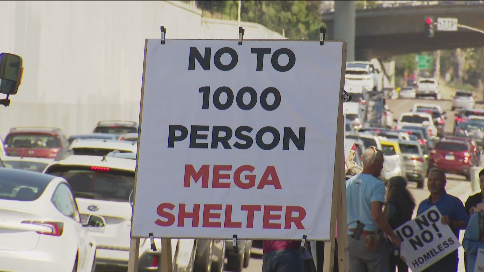 A group of San Diego residents rallied near the proposed homeless shelter site in Middletown Friday afternoon.