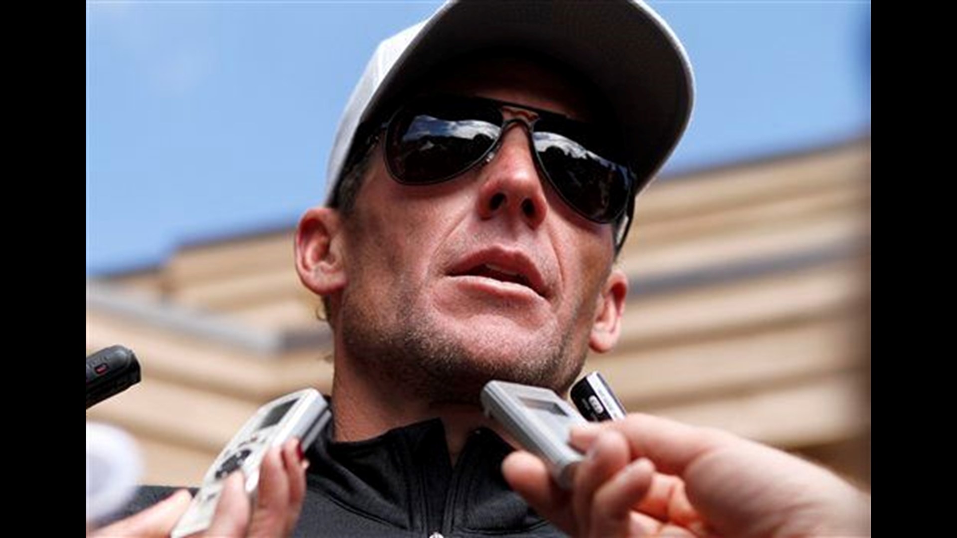 Armstrong says he's happy investigation over