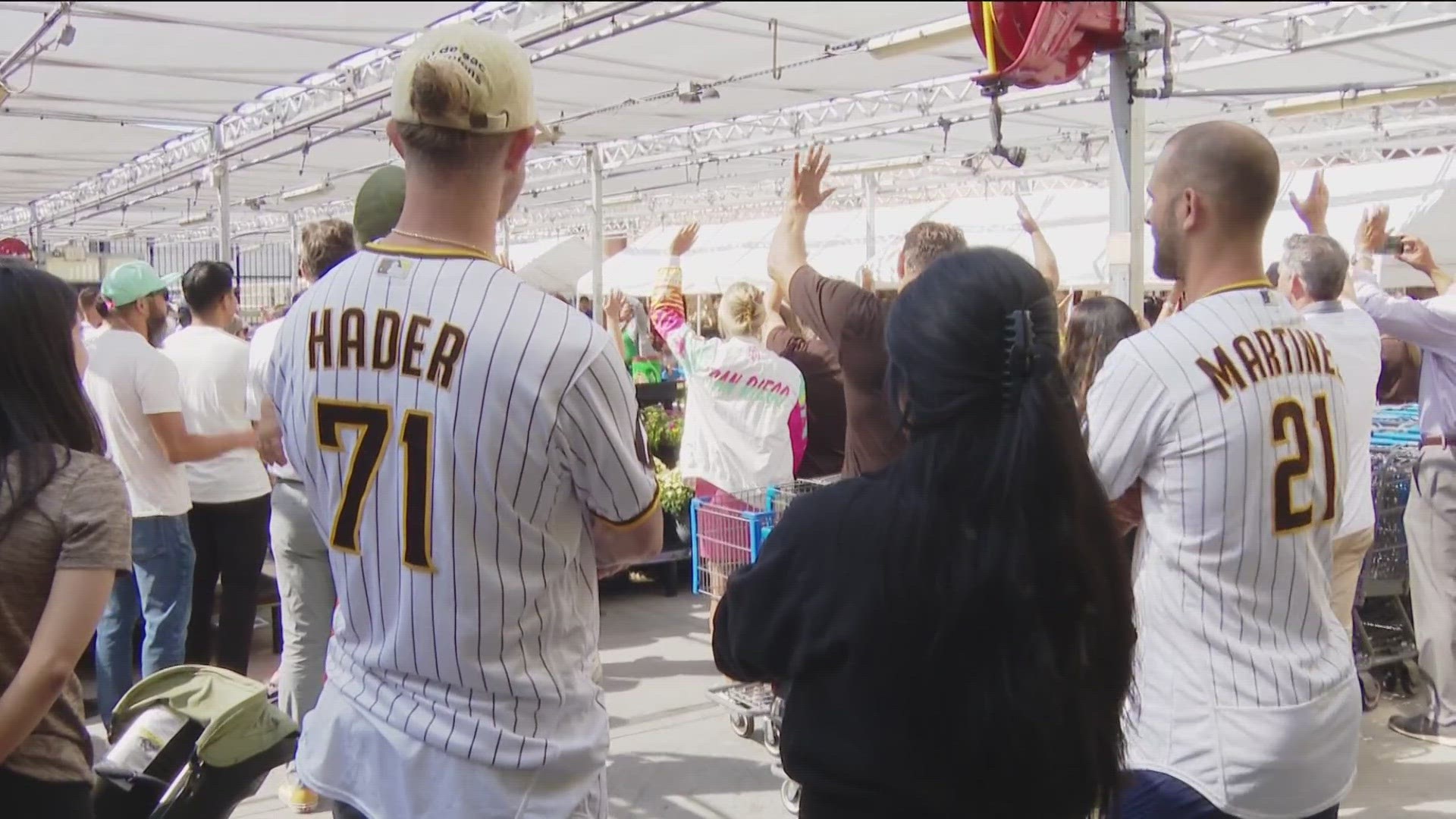 Nearly 100 students from the Monarch School went on a shopping spree with Padres players and volunteers from the organization.