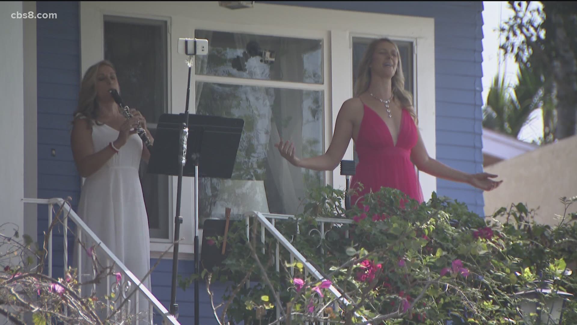 For weeks, crowds pulled up chairs and filled the streets and sidewalks to hear classically trained opera singer Victoria Robertson perform from her porch