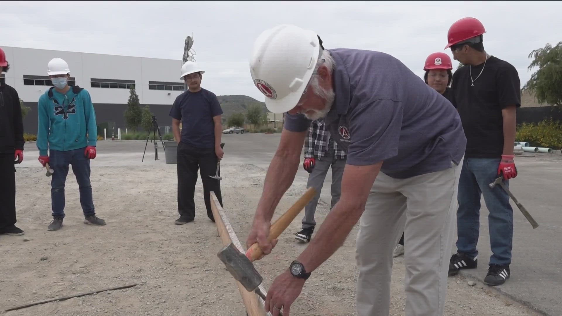 King Chavez Community High School students, undergo five hands-on workshops, including carpentry and concrete layout.