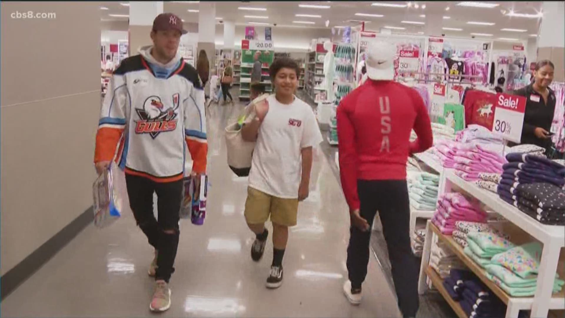 The Junior Seau Foundation hosted its 25th annual Shop with a Jock event Tuesday to help local underprivileged children buy gifts for their friends and family.