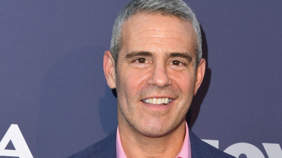 Andy Cohen's Baby Snuggles Up to Mark Consuelos in 400 Fendi Pants