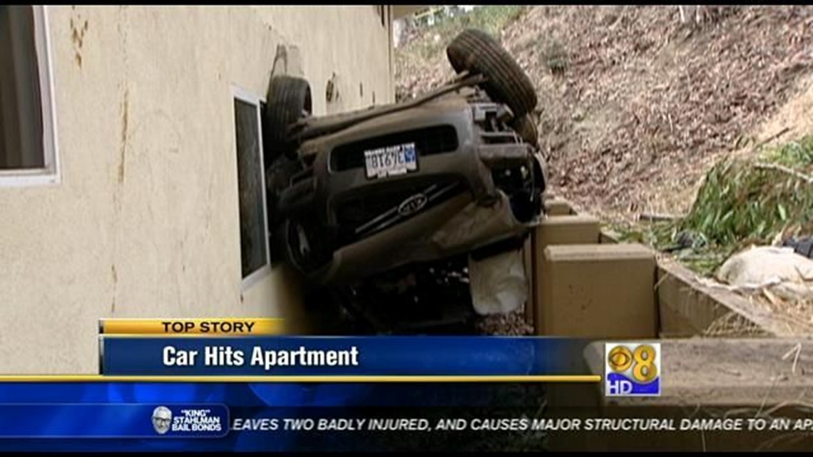 Car rolls down embankment into North Park apartment