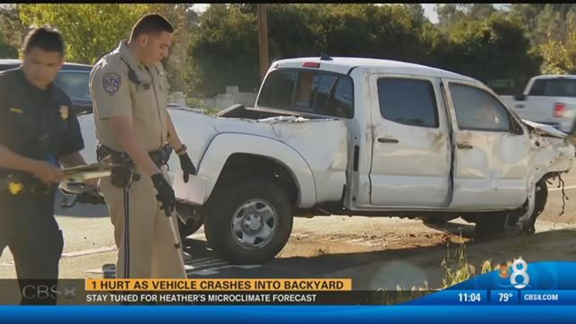 Car crashes into wall in El Cajon, lands on yard