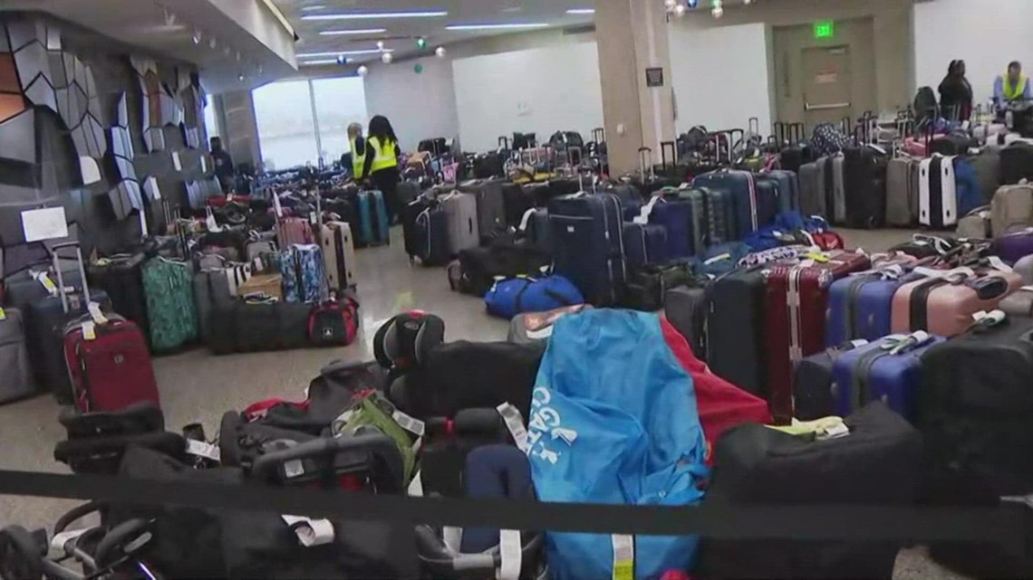 Luggage everywhere! Food court makeshift baggage claim area at