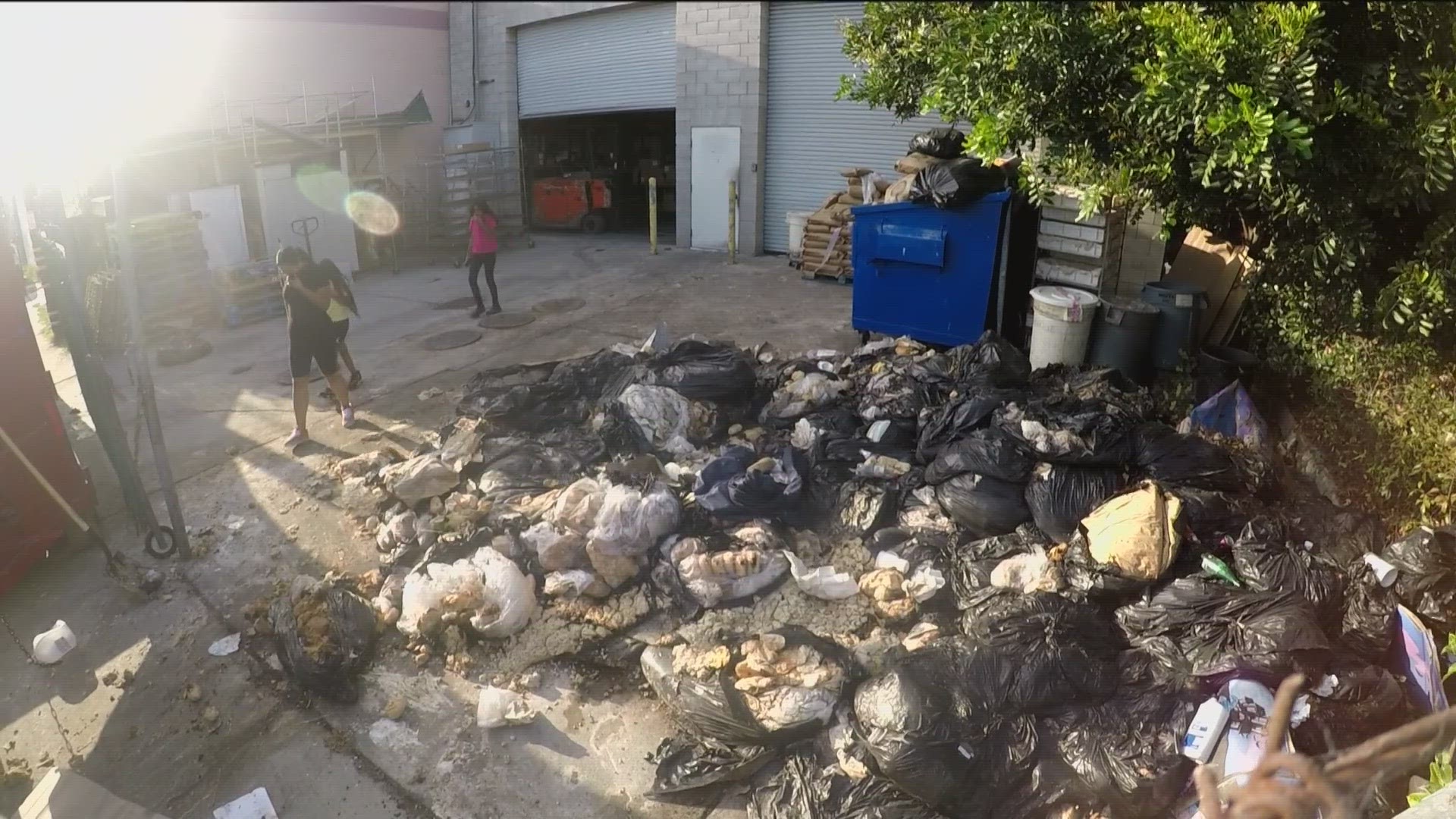 Families living on Boston Avenue feel sick after noticing a stench. They say it's coming from the bakery next door. The owner has been piling trash of rotten dough.