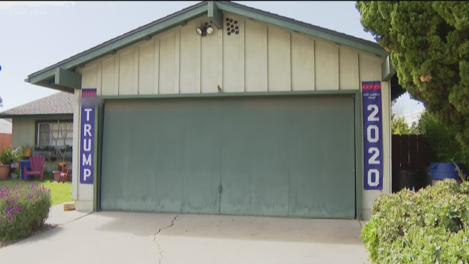 Bill Niedzwiezki received a notice from the city saying someone filed a complaint about the banners hanging from his garage.