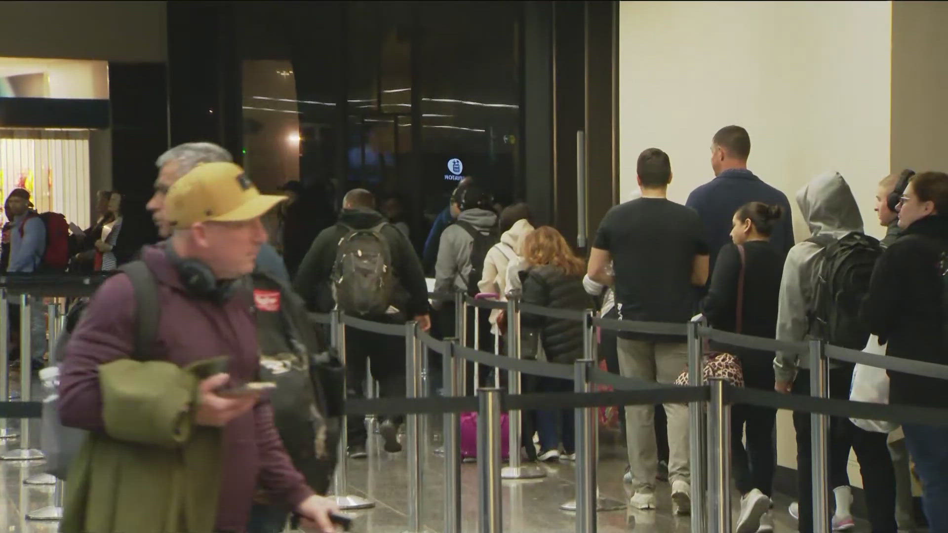 The airport expects to see as many as 1.3 million people arriving and departing during the winter holiday travel period.