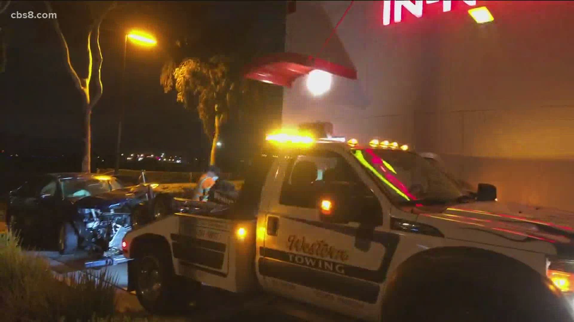 The car came off southbound State Route 163 crashing into a fence outside In-n-Out Burger on Kearny Mesa Road.