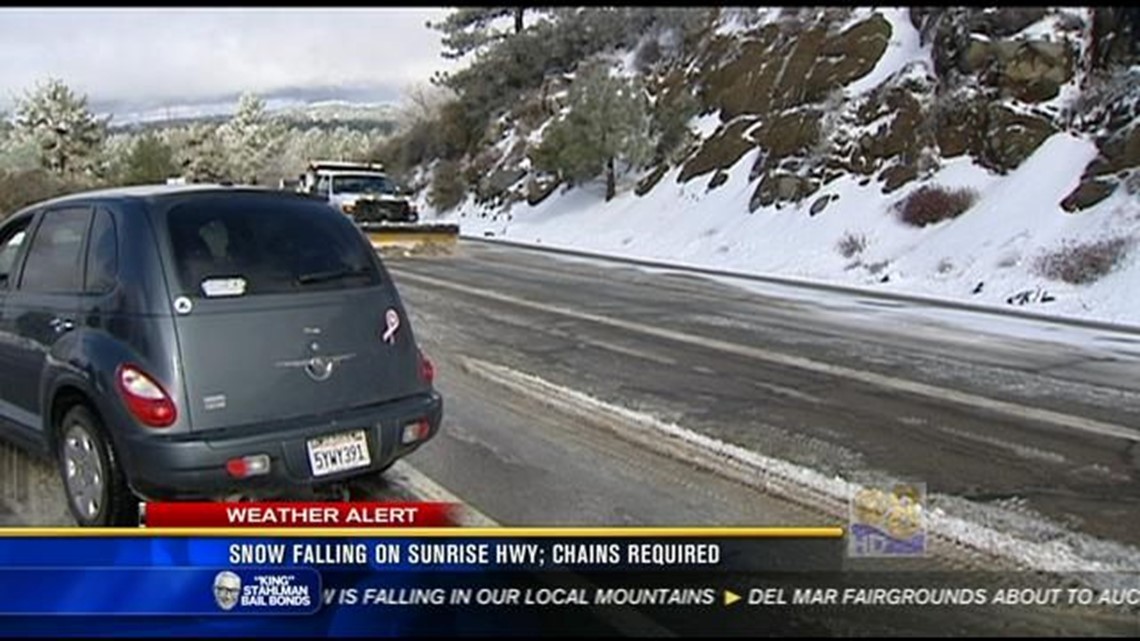 Snow falling on Sunrise Highway, chains required