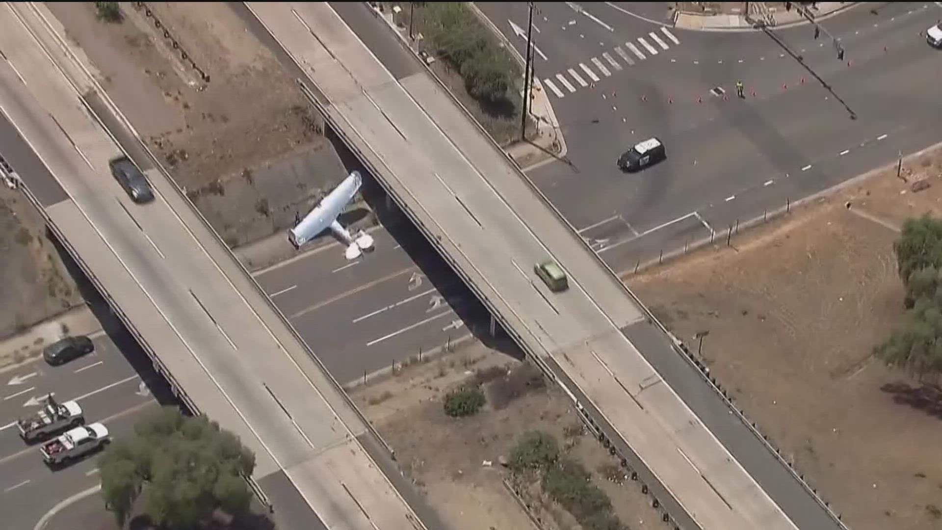 Greenfield Drive has been closed due to that plane crash near Interstate 8 east of Gillespie Field, but no freeway lanes are impacted, according to El Cajon police.