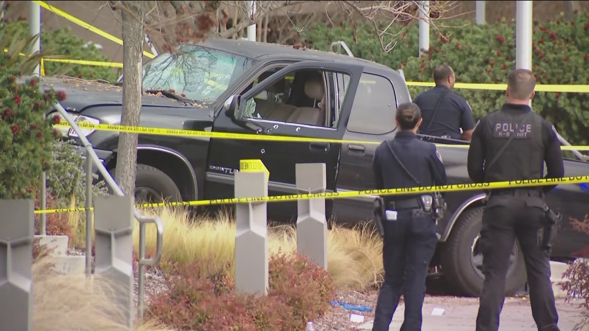 The shooting occurred after a person tried to run over officers in front of the El Cajon police station with their vehicle.