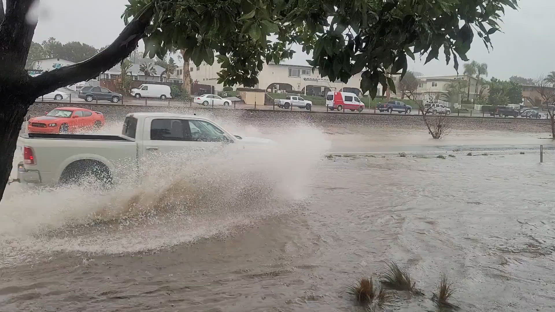 Business owners near Coast Highway 101 have lined their buildings with sandbags and flood barriers as they brace for more rain.