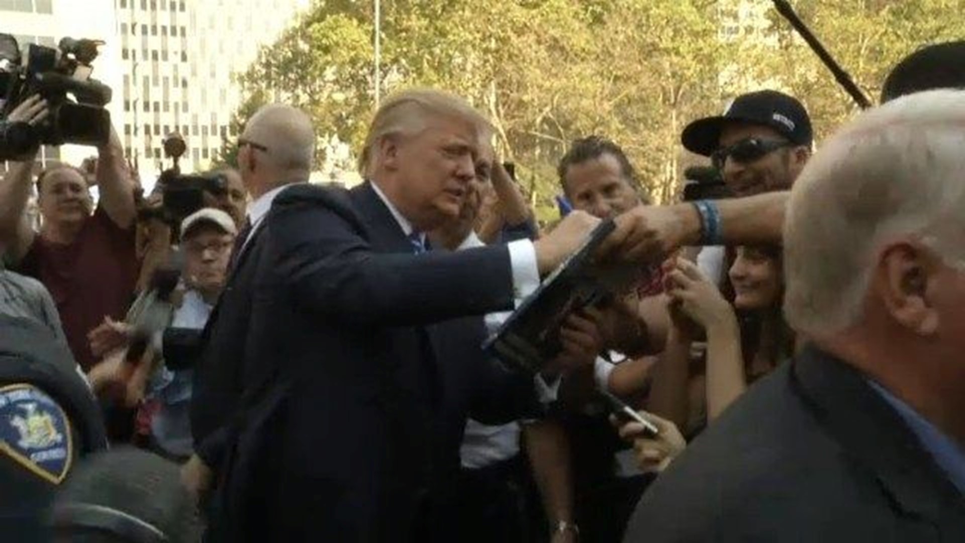 Trump reports for New York jury duty, takes campaign break