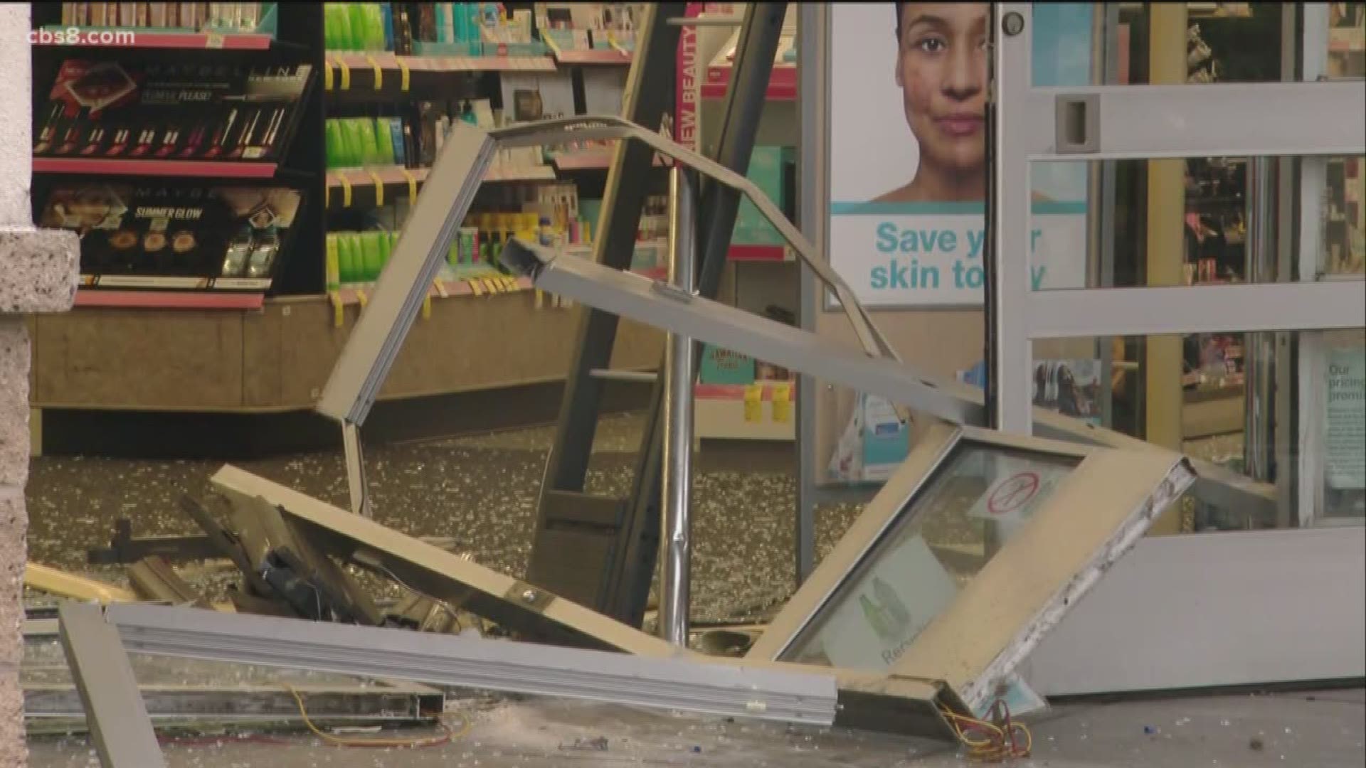 According to police, a silver pickup truck crashed through the front of the store where two employees were inside.