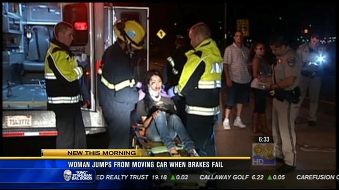 Woman jumps from moving car when brakes fail | cbs8.com