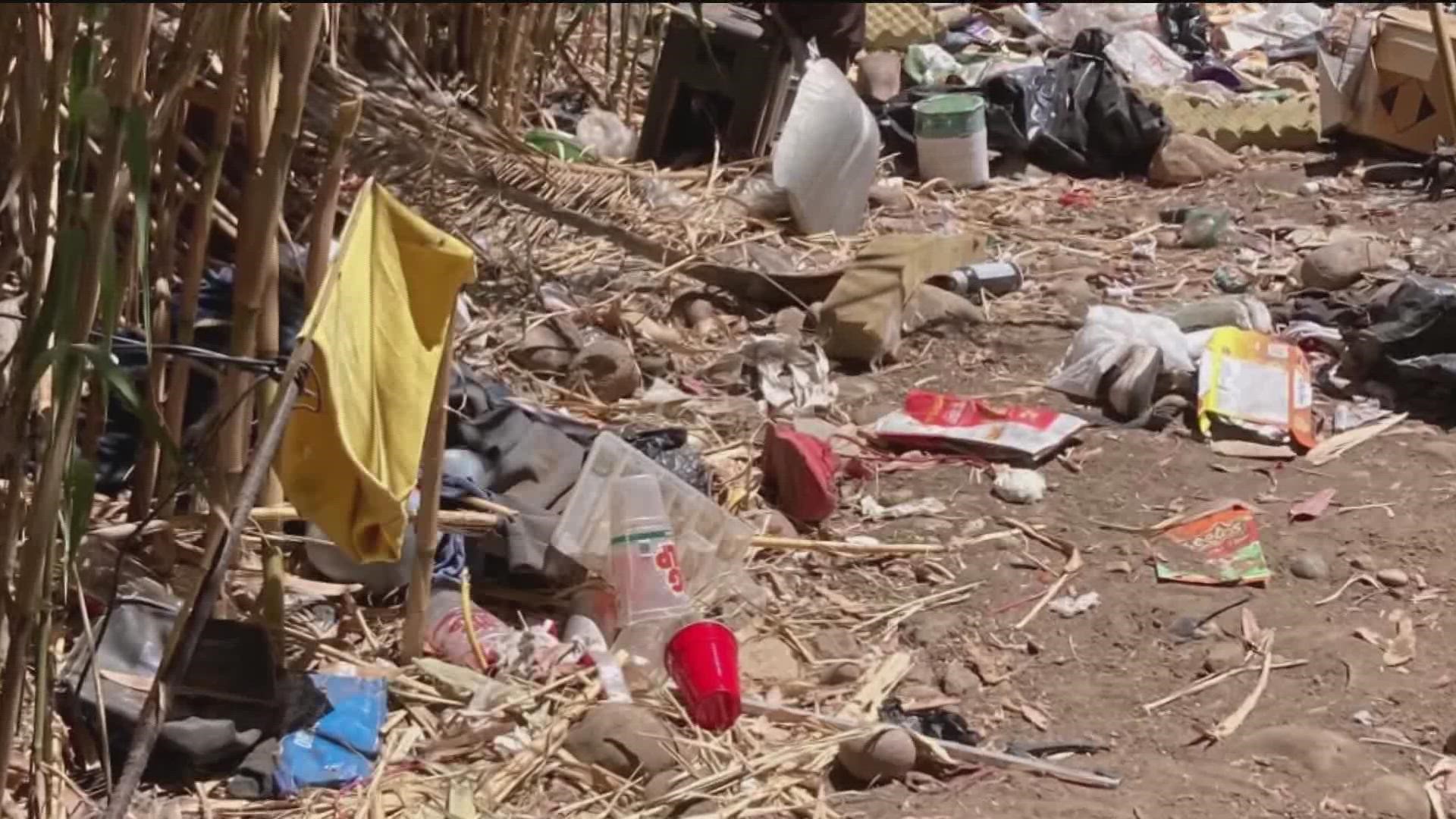 Neighbors have reported the homeless encampment numerous times and fear for their safety