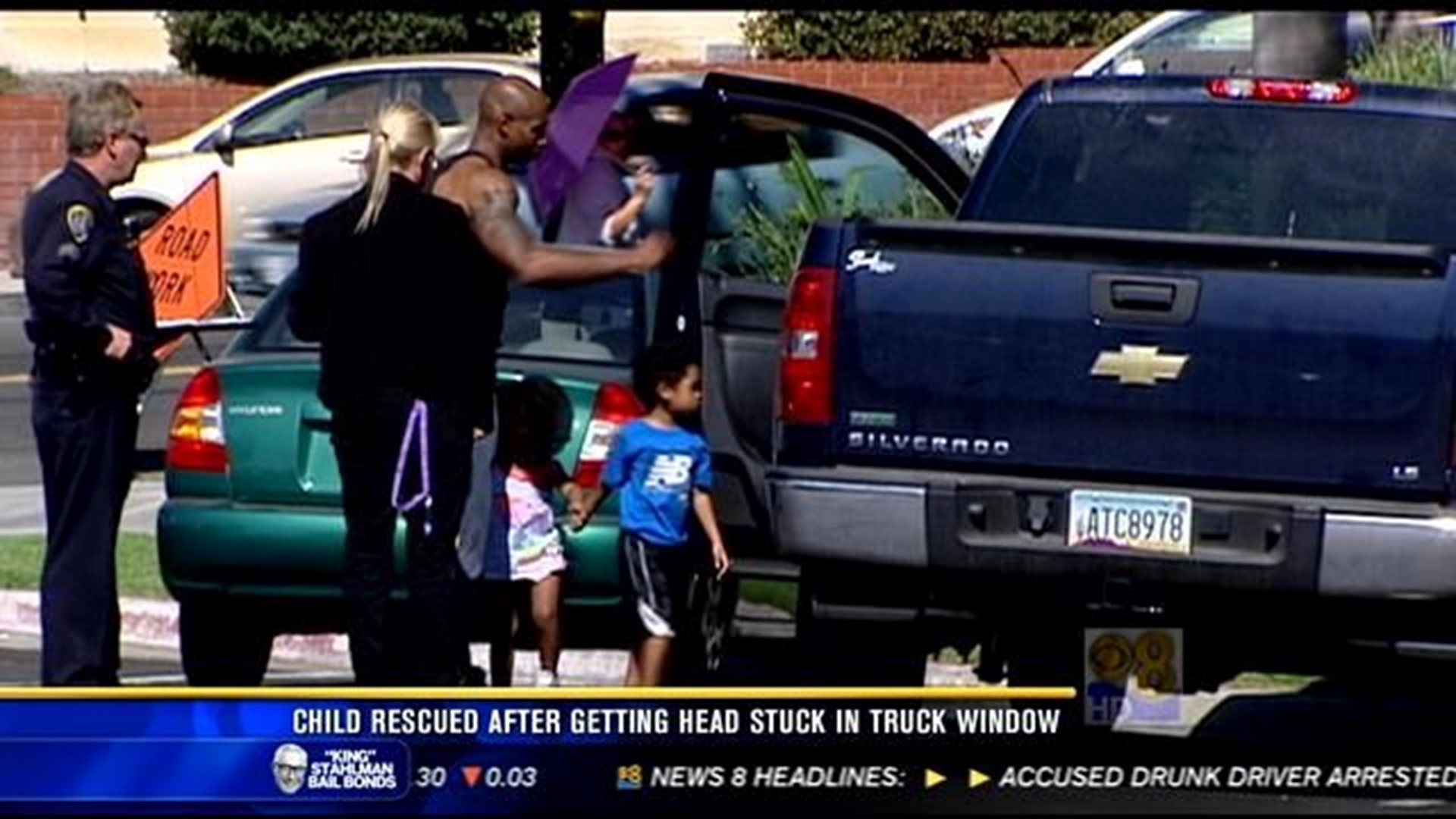 Child rescued after getting head stuck in truck window