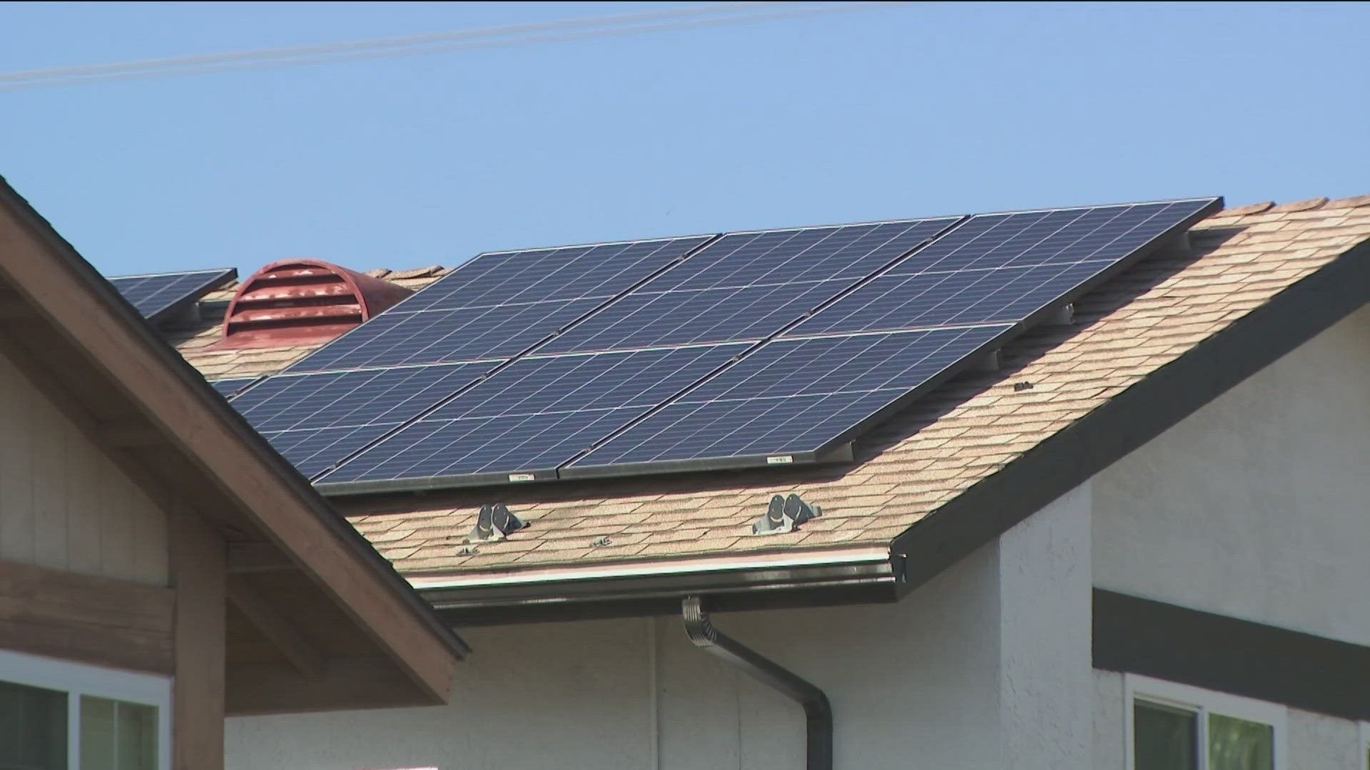 A new proposed California bill would cut rooftop solar energy credits in half if approved.