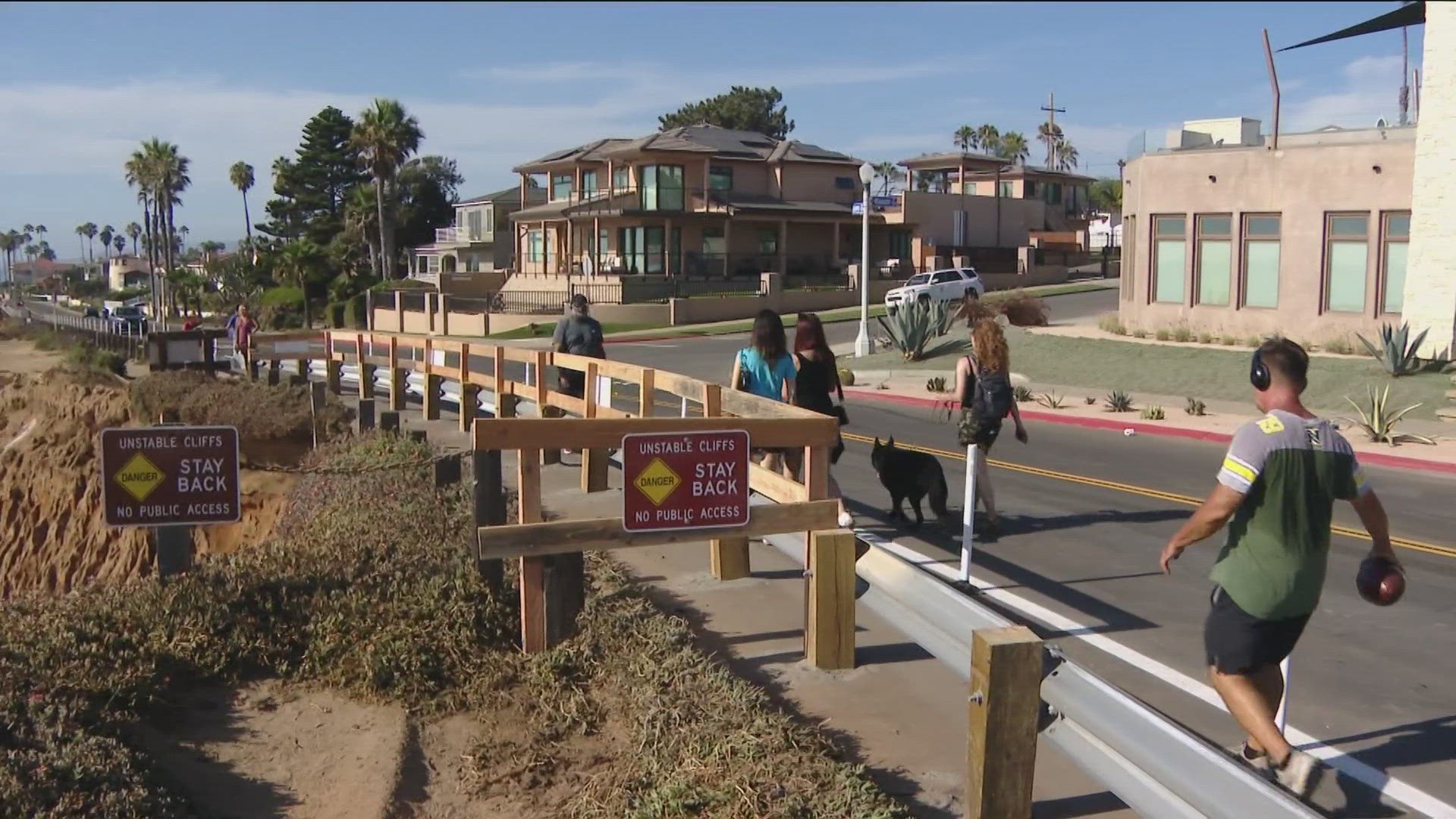 City crews worked to move a guardrail on Sunset Cliffs Boulevard inland due to the crumbling bluffs.