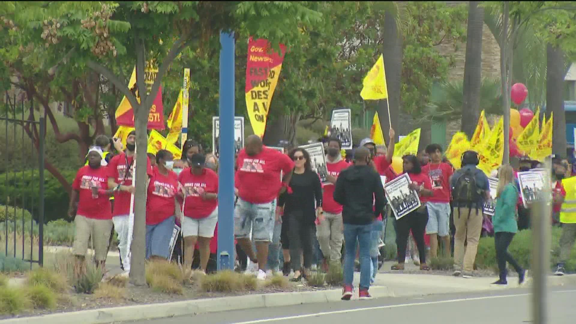 Fast-food workers gathered to demand higher wagers and safer work conditions.