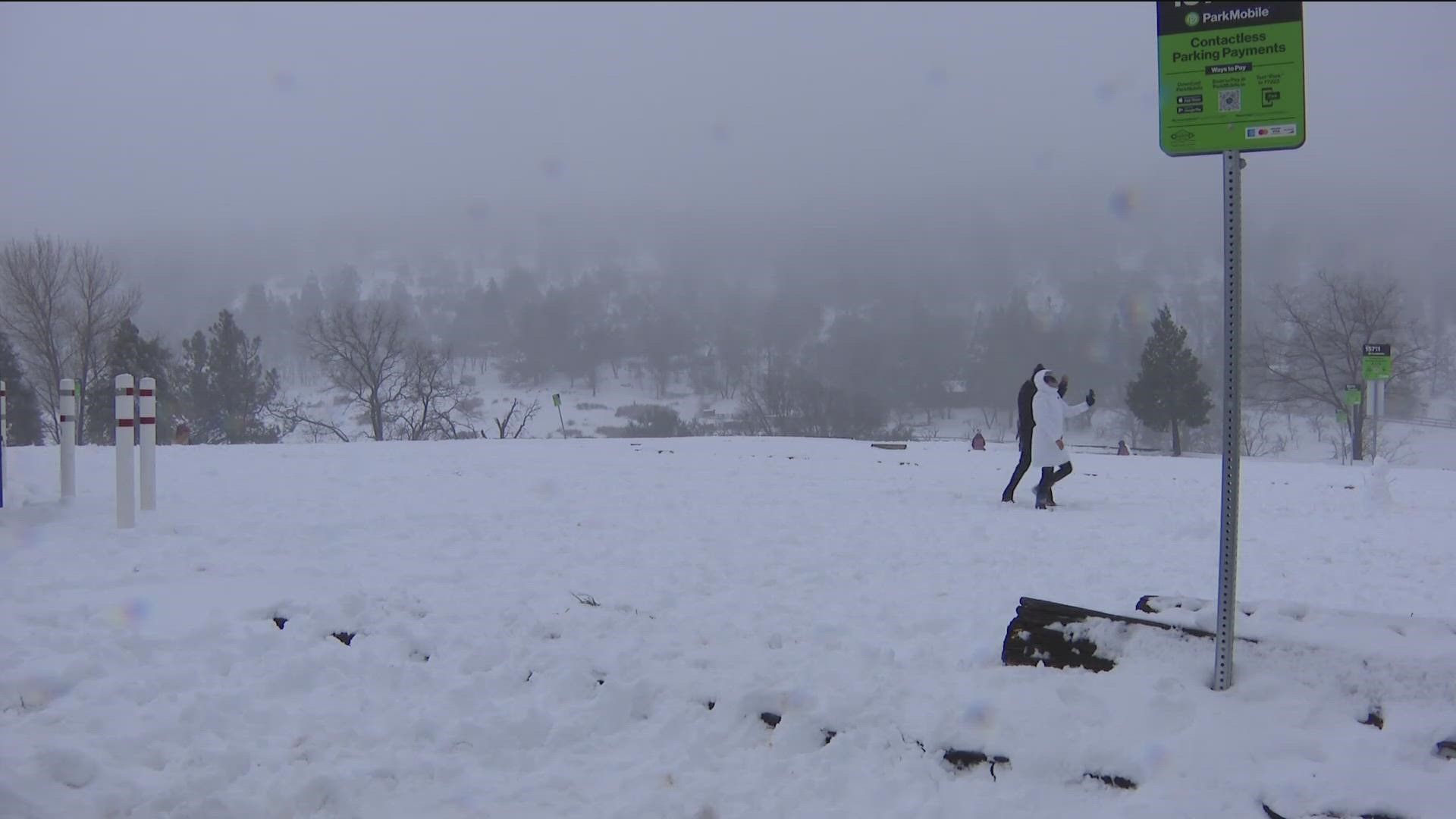 A blizzard warning was issued by the National Weather Service for the San Bernardino Mountains as gusty winds and torrential rain batter San Diego County.