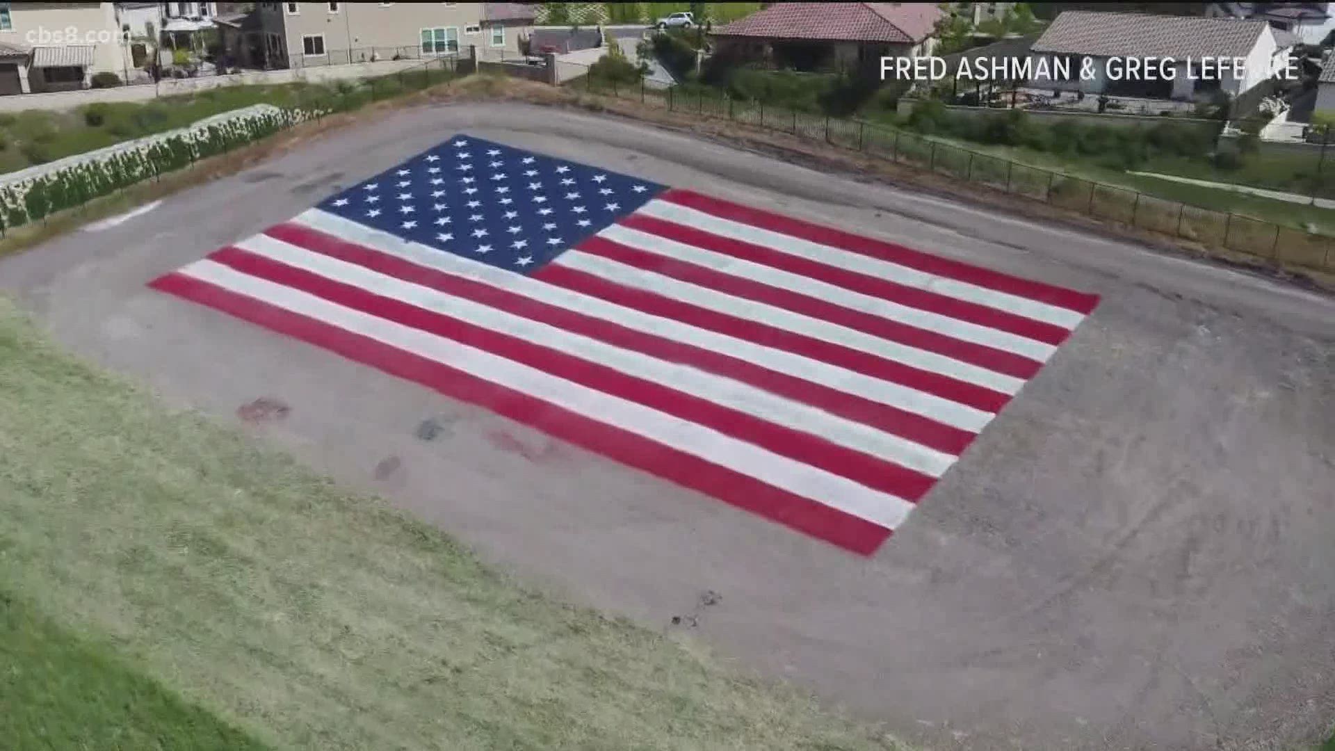 11,000 square foot flag at Antique Gas and Steam Engine Museum pays tribute to fallen veterans.