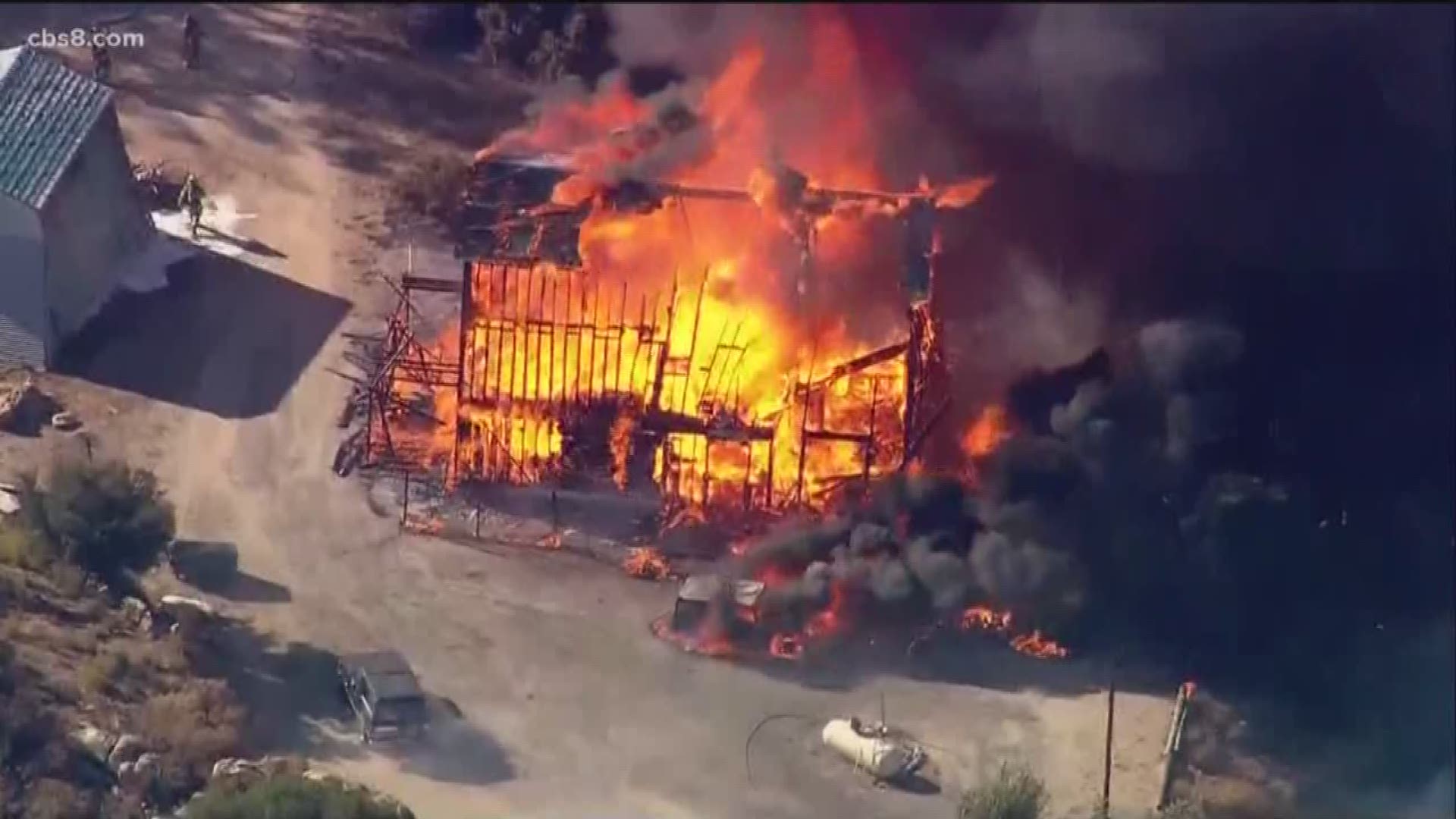 Two residents were injured late Thursday afternoon when an intense fire leveled their home and spread into adjacent vegetation in Campo.