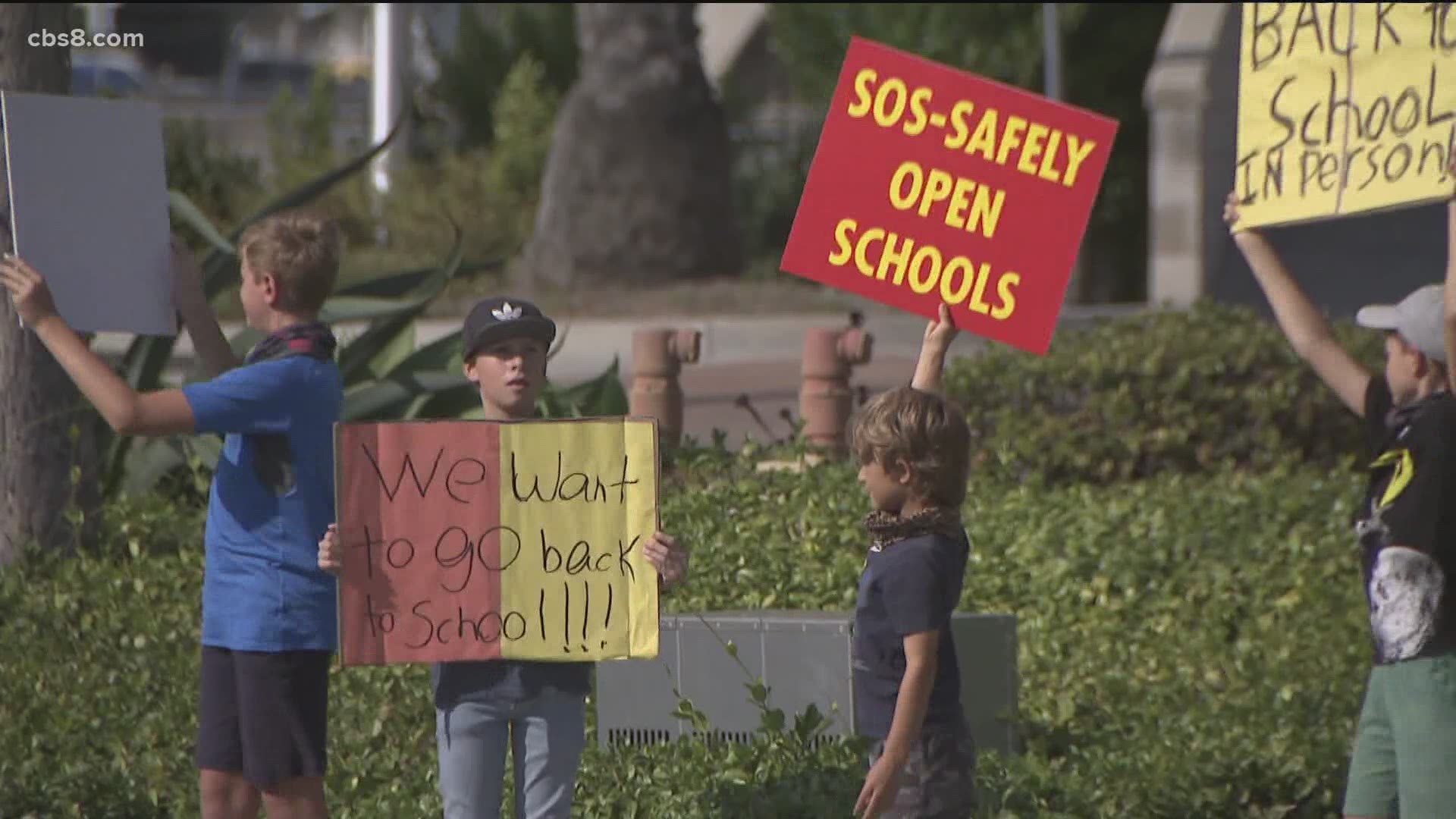 San Marcos parents rally to open schools for in-person learning | cbs8.com