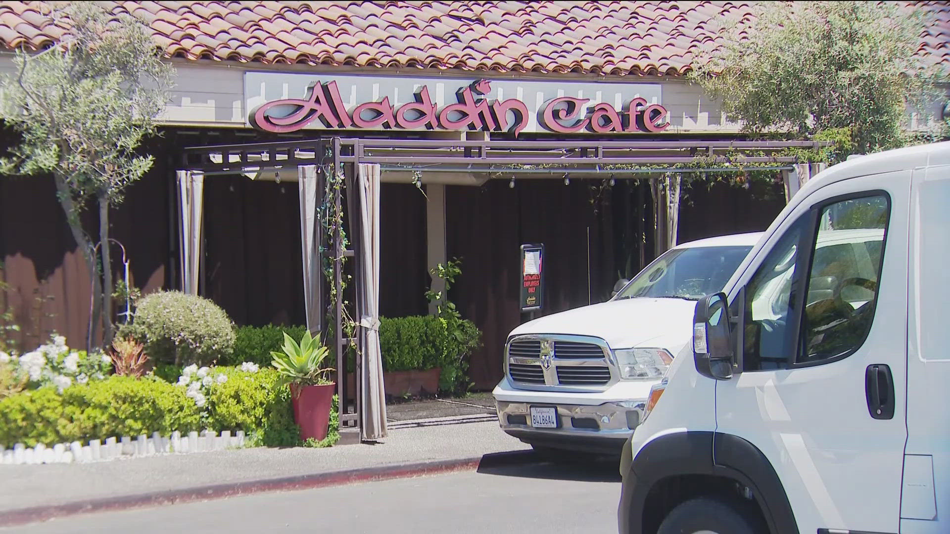 "We are very sorry if we were involved in this," said Aladdin Cafe owner Hamdi AbuKhalaf. According to the county, there are 98 probable and confirmed cases.