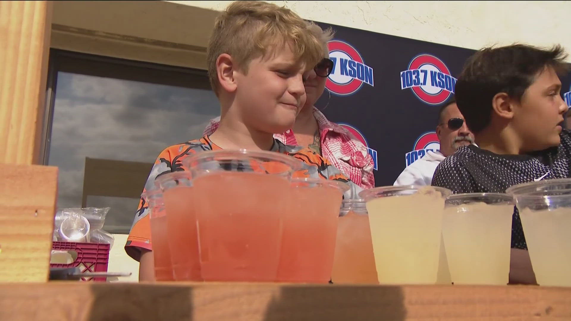 A long line of supporters waited in line for a cup of lemonade after someone stole Liam's lemonade stand in Ramona.