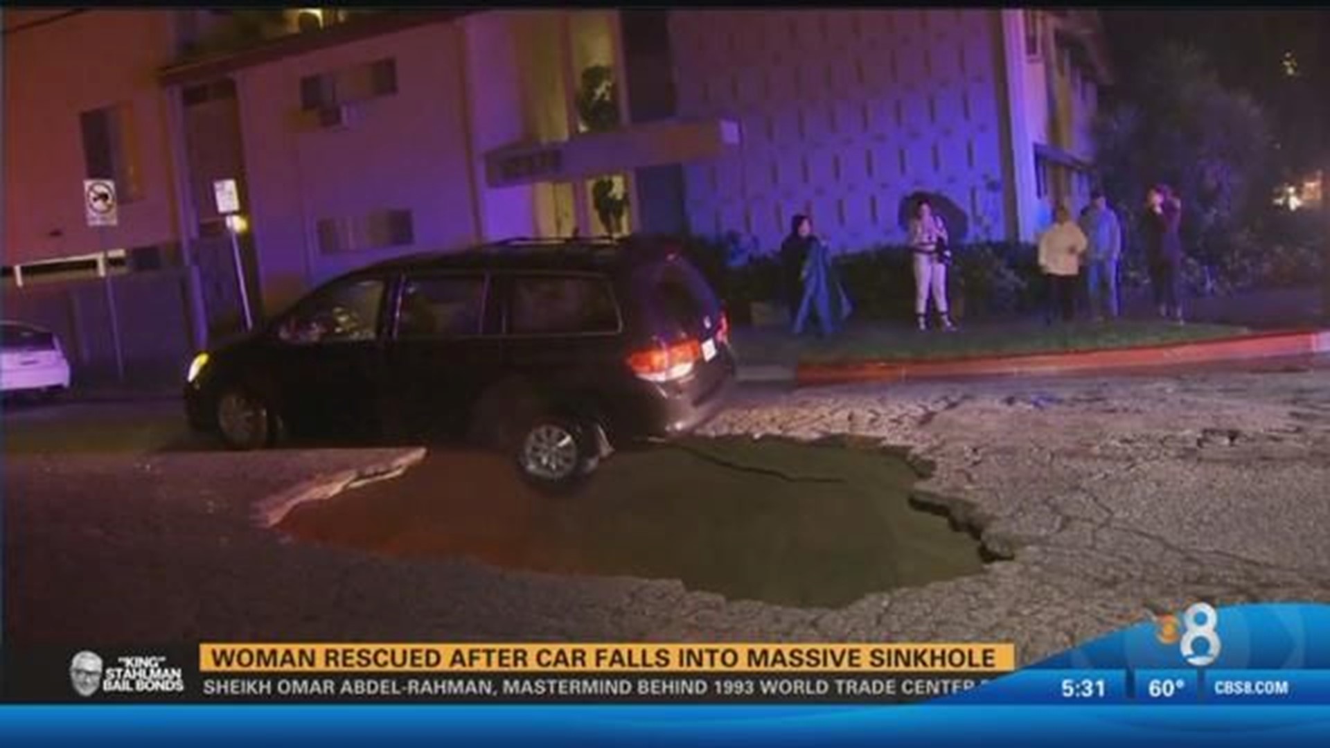 Woman Rescued After Car Falls Into Massive Sinkhole Cbs Com