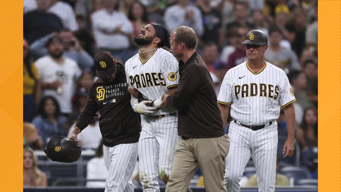 Padres star Fernando Tatis Jr. hurt on slide, leaves game | cbs8.com