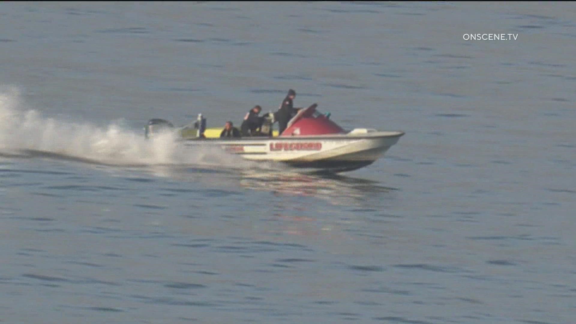 Lifeguards rescued two men from a rocky ledge of Sunset Cliffs wearing life vests and suffering from symptoms of hypothermia, Lt. Clark said.