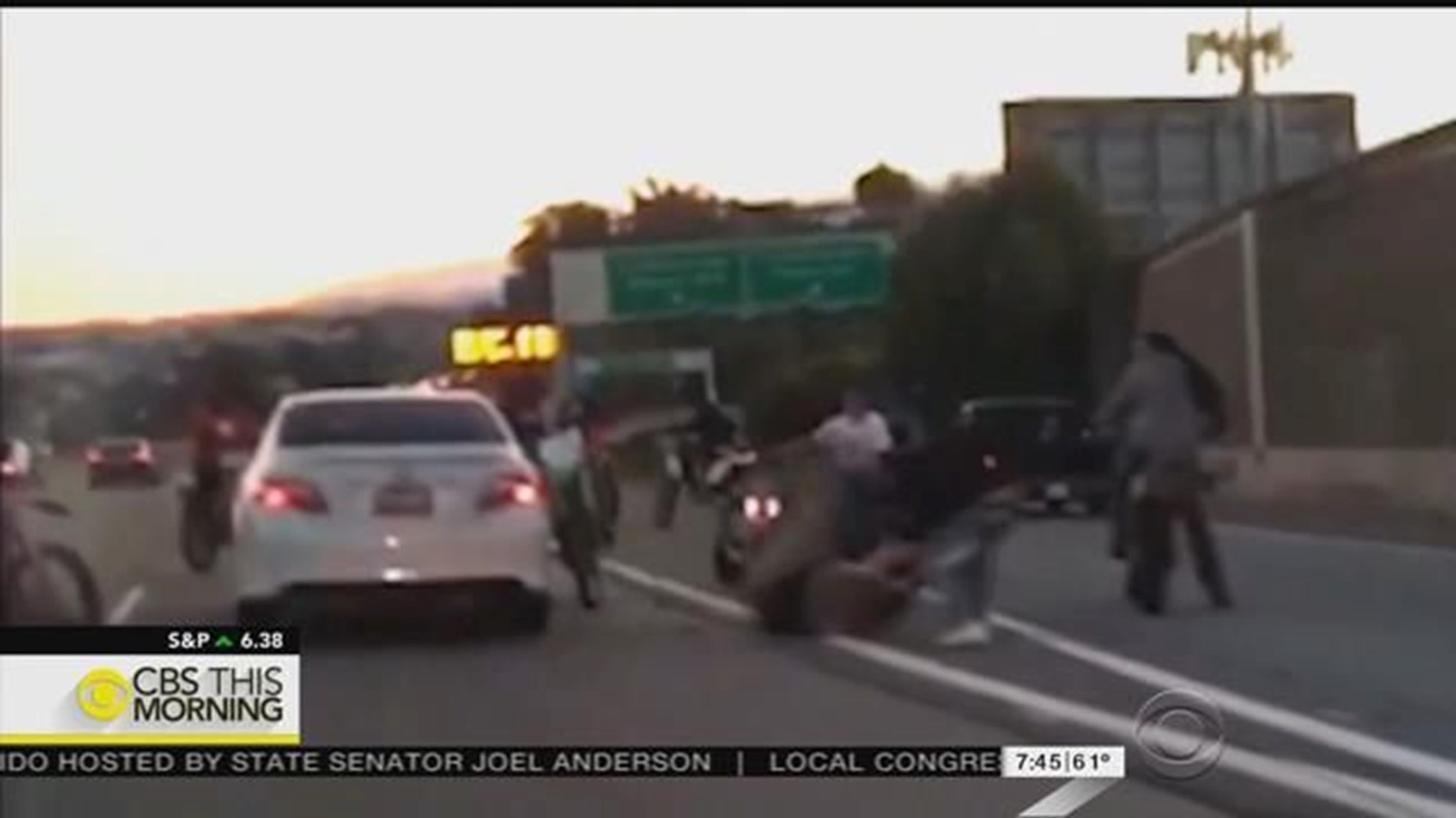 Video captures biker ambush on driver on California freeway | cbs8.com