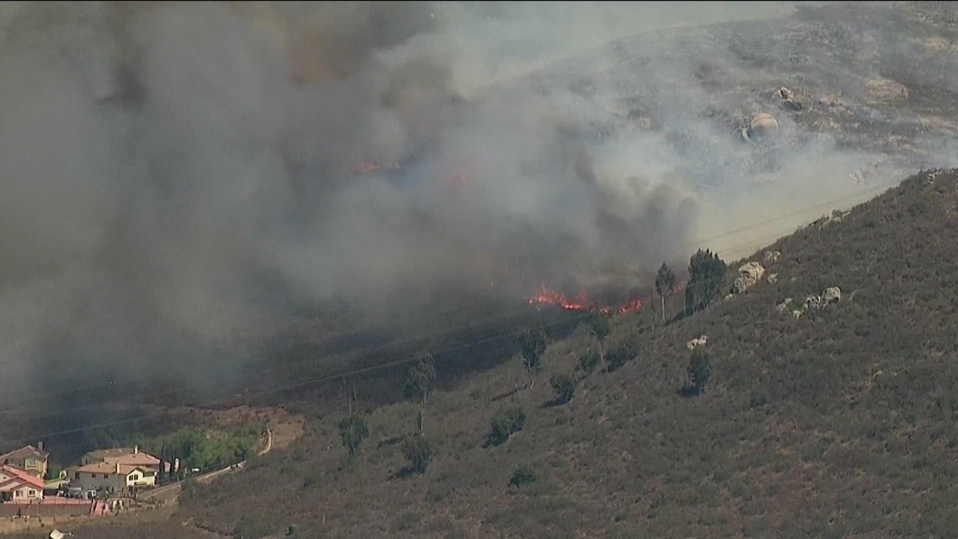 CBS 8's Alex Cheney was in Jamul as the fire burned close to homes in the area near Spring Valley and Jamul on Wednesday, July 9.