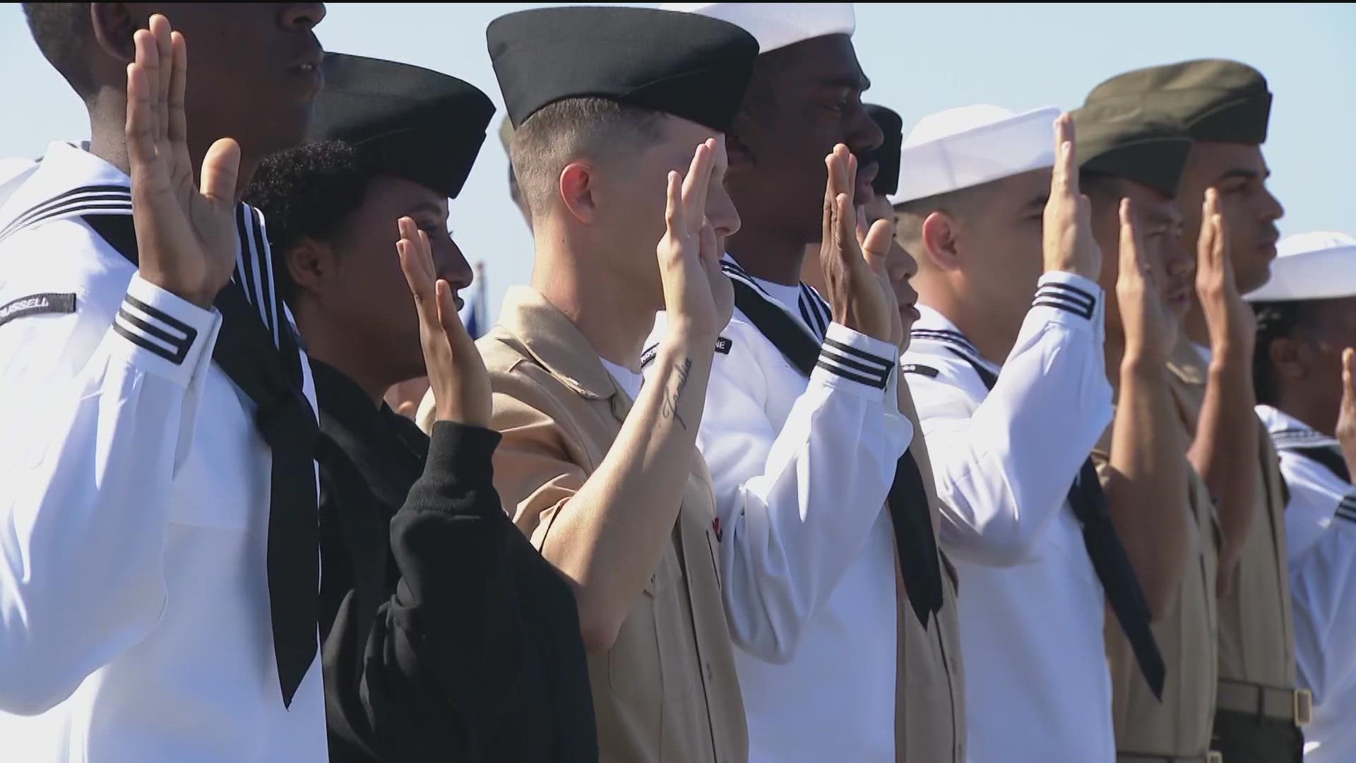 The 20 service members represent the U.S. Navy, Marines and National Guard.