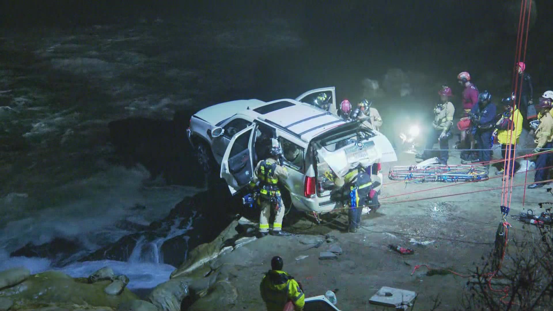 When first responders arrived on the scene, they discovered a white Cadillac Escalade on the rocks of La Jolla Cove, partially hanging over wind-whipped ocean waves.