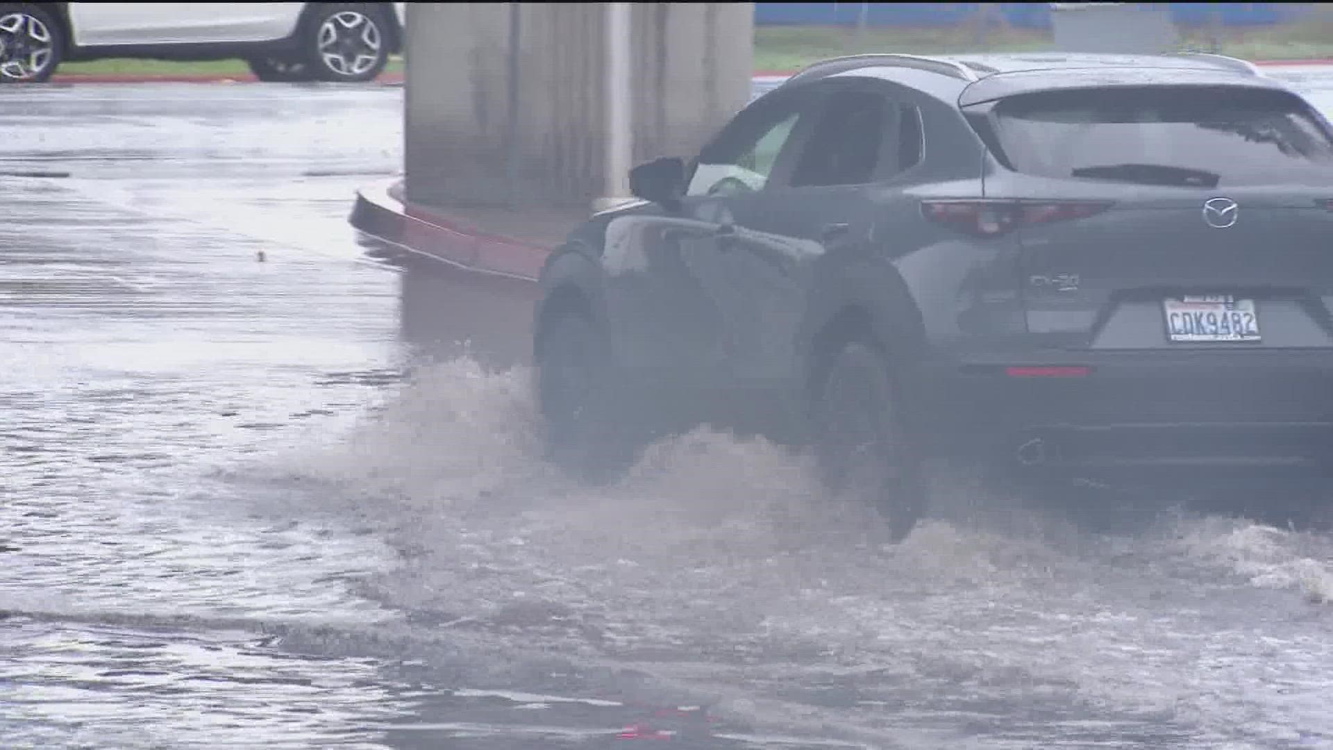 Monday's storm flooded roads in Mission Valley and dropped several inches of snow in the local mountains.