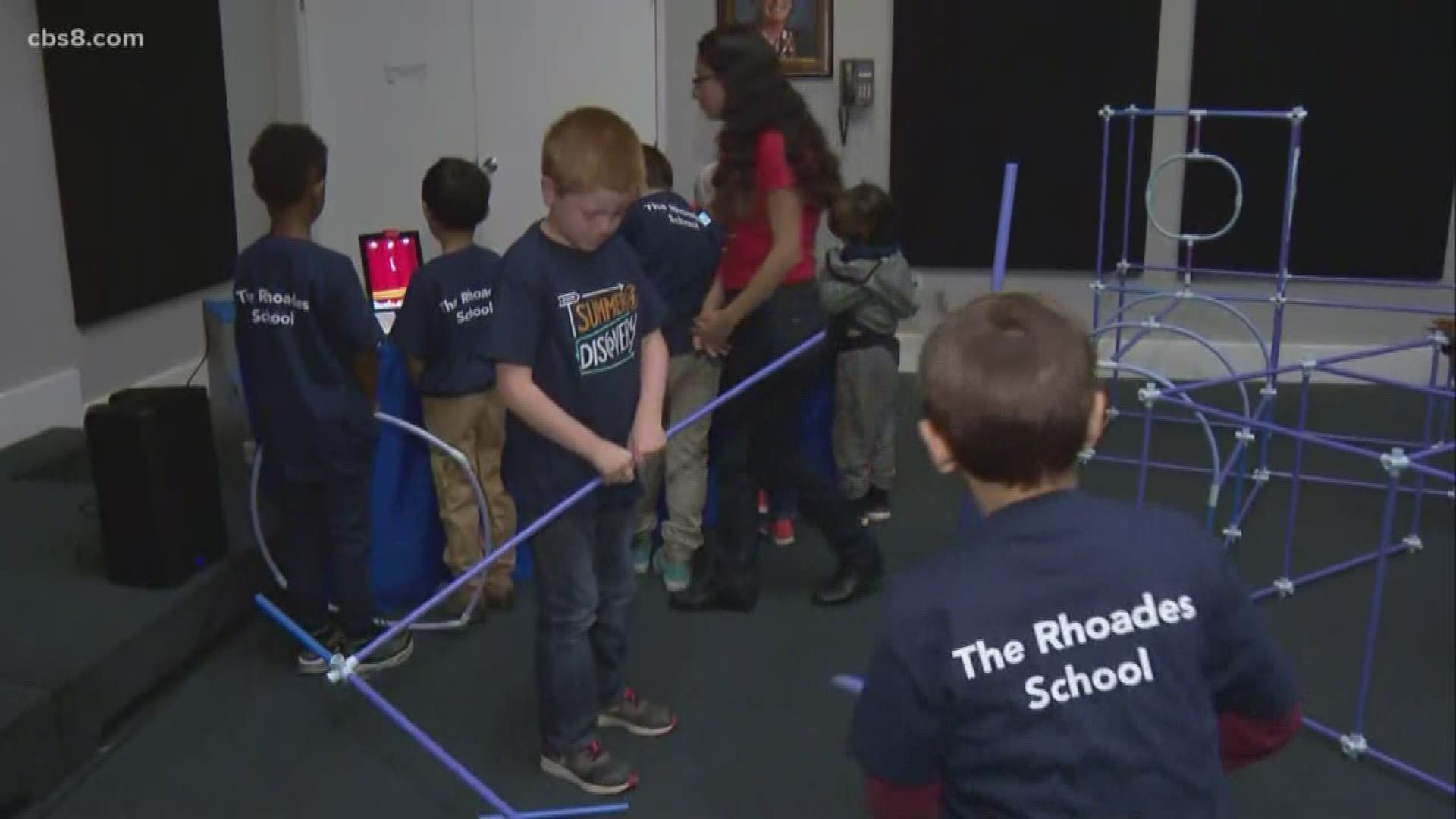 Kids at The Rhoades School show off their creativity while building bridges