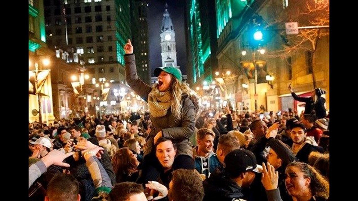 Philadelphia Eagles Fans Climb City's Greased Poles to Celebrate Win