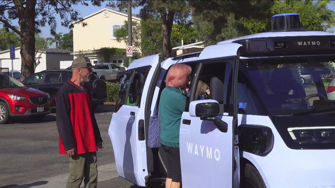Pink Waymo Seniors get firsthand look at a Waymo autonomous vehicle ahead of San ...