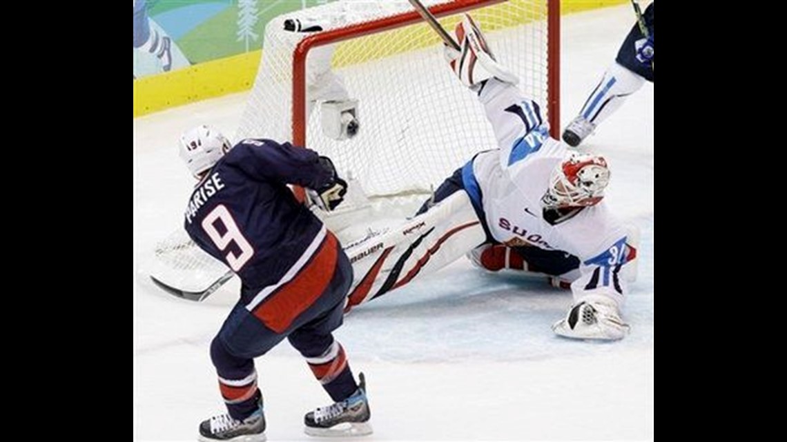 US breaks medal record; hockey team in gold game