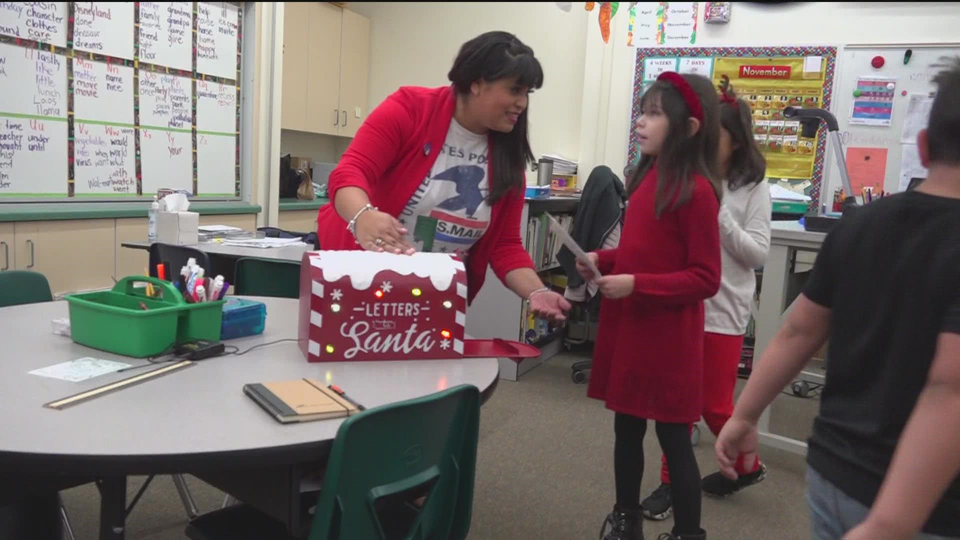 The U.S.P.S. has been doing Operation Santa for 100 years but this is the first year they've partnered with a school to help fulfill wishes for children in need.