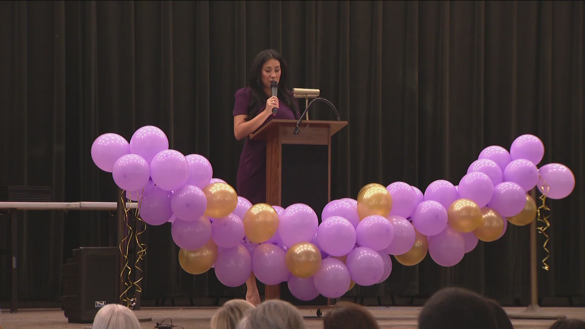 A domestic violence survivor shared her story and community leaders highlighted resources to empower and help victims.